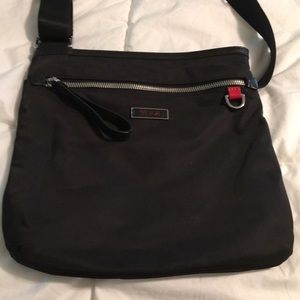 Tumi crossbody bag. Perfect condition. NWOT